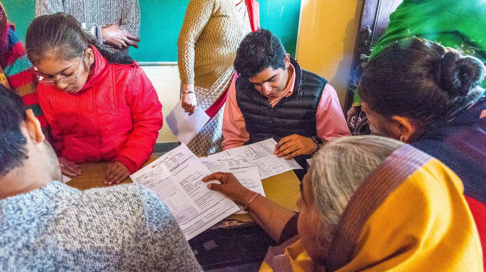 Families registering at a One Life At A Time medical camp