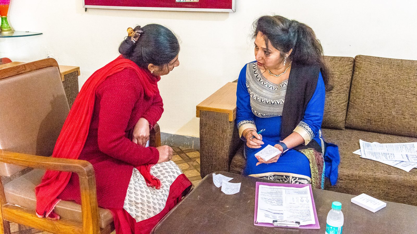 Women talking together during a One Life At A Time outreach session